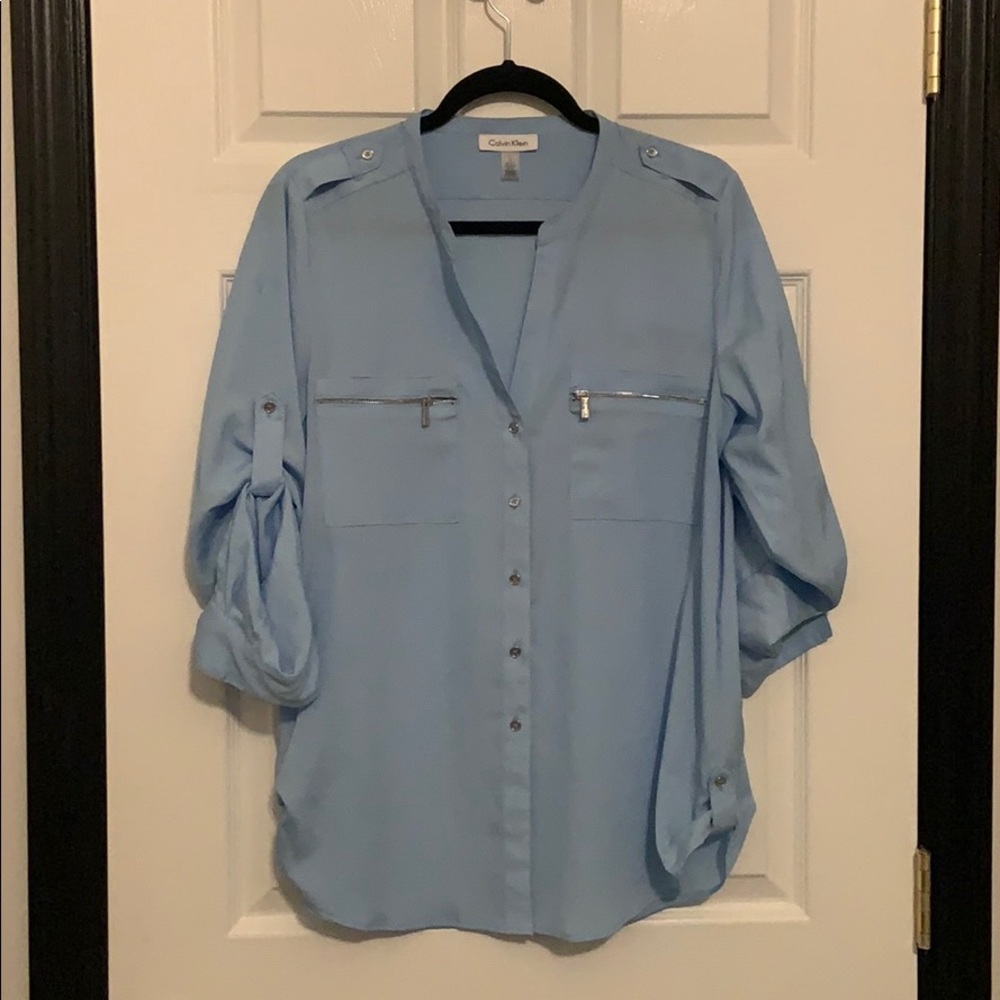 Blue button-up blouse